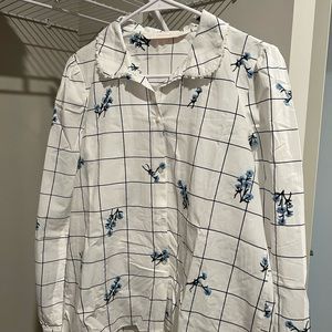 Never worn. Size Small. Flowers are embroidered